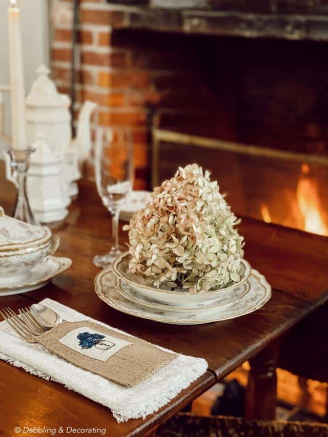 Cozy Fireside table set with china and New England old world charm.