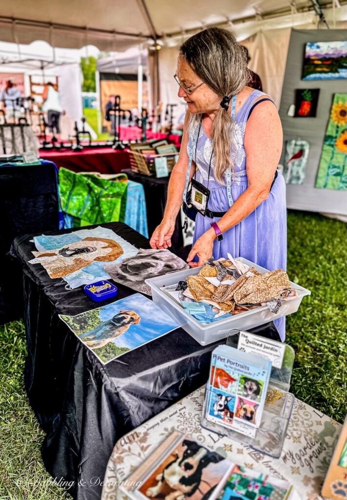 Woman at Quilt Vendor Booth