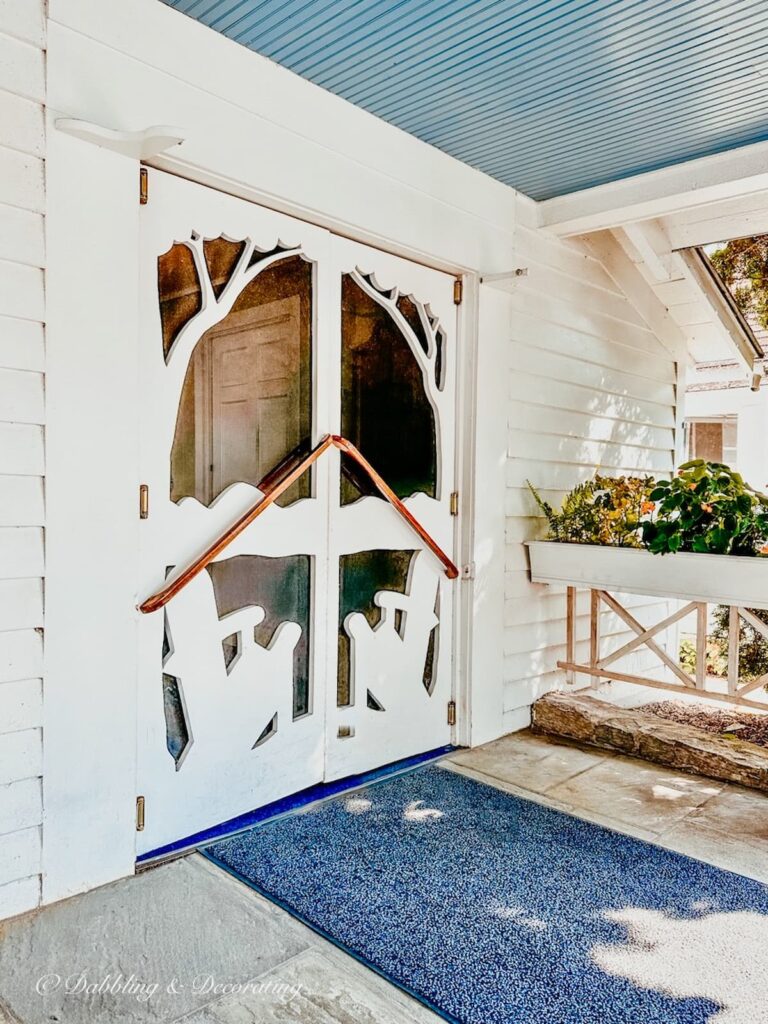 Two Screen Doors with Adirondack Chairs