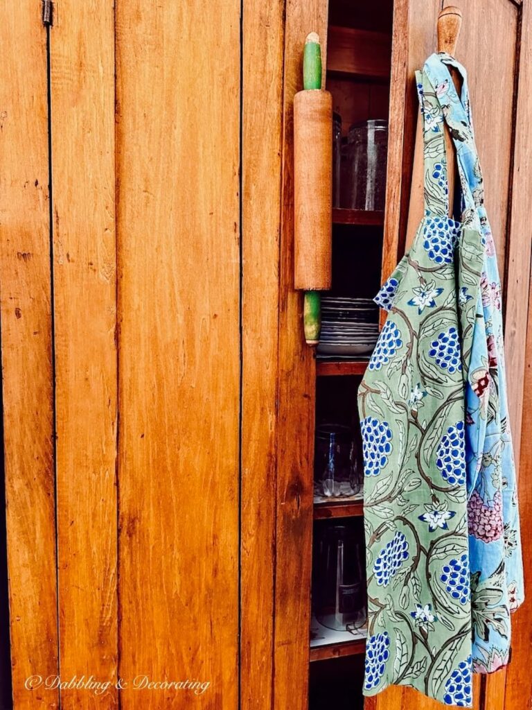 Bakers Pantry with rolling pin handles and cloth bags.