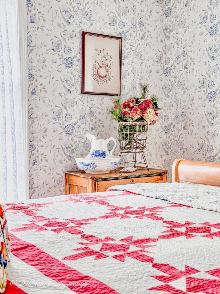 Heirloom Quilt Pink and White on Sleigh Bed.