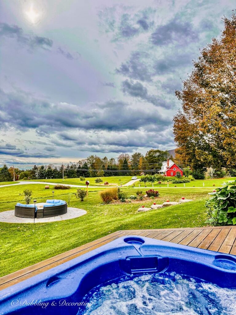 Fall Foliage Backyard View with hot tub and fire pit.