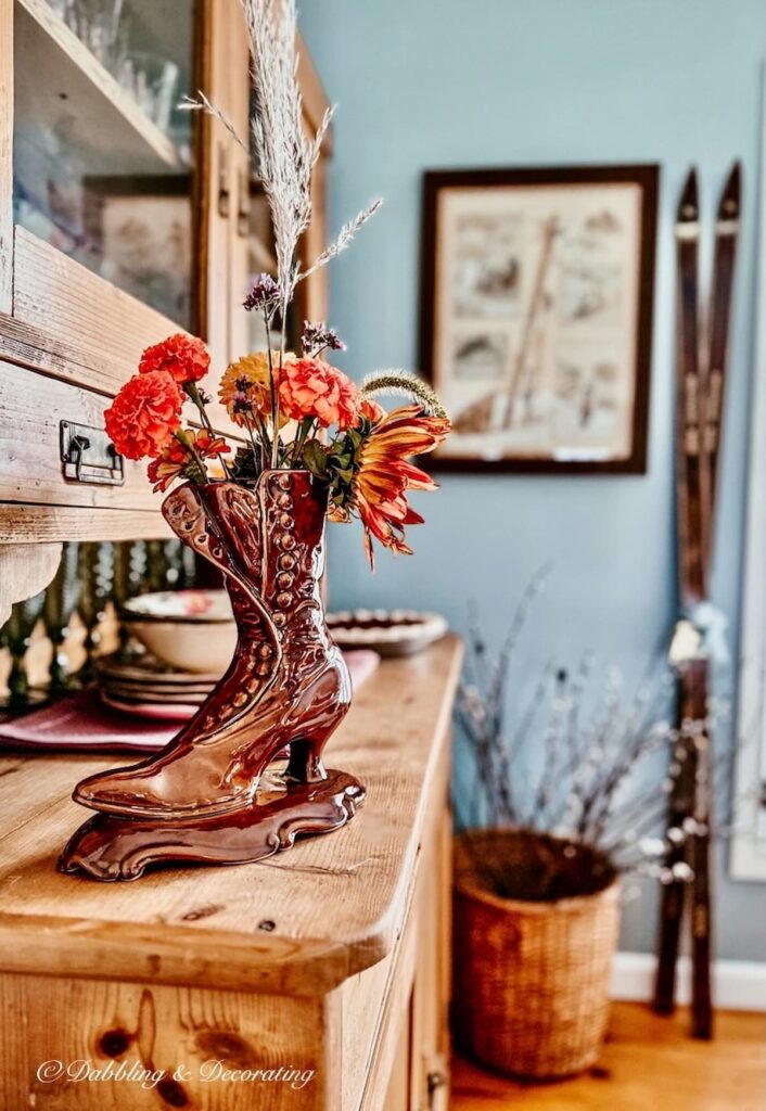Vintage Boot McCoy Vase with flowers.