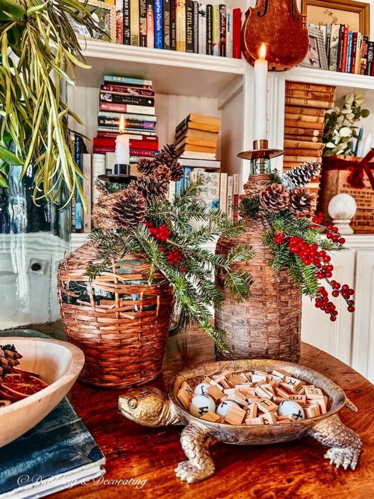 Demijohns with candles decorated for Christmas