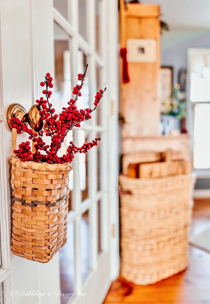 A wicker basket with red berries, an iconic decoration for the 12 Days of Christmas.