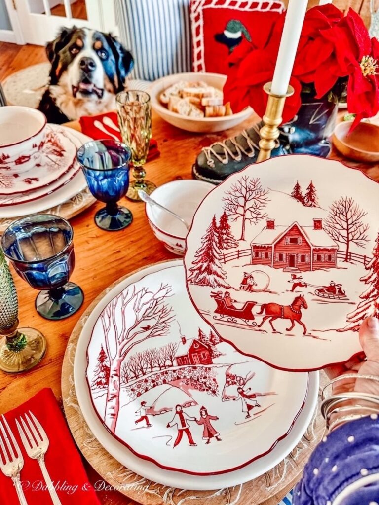 A cabin-themed dog enjoys a festive table setting at Christmas.