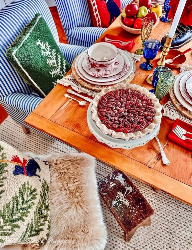 Pecan Pie on Christmas Cabin Table Setting with vintage stool.