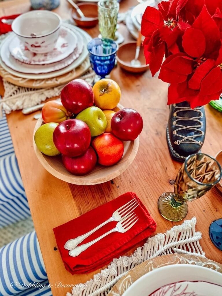 Wooden Bowl of Fruit on Cabin Christmas Table Setting