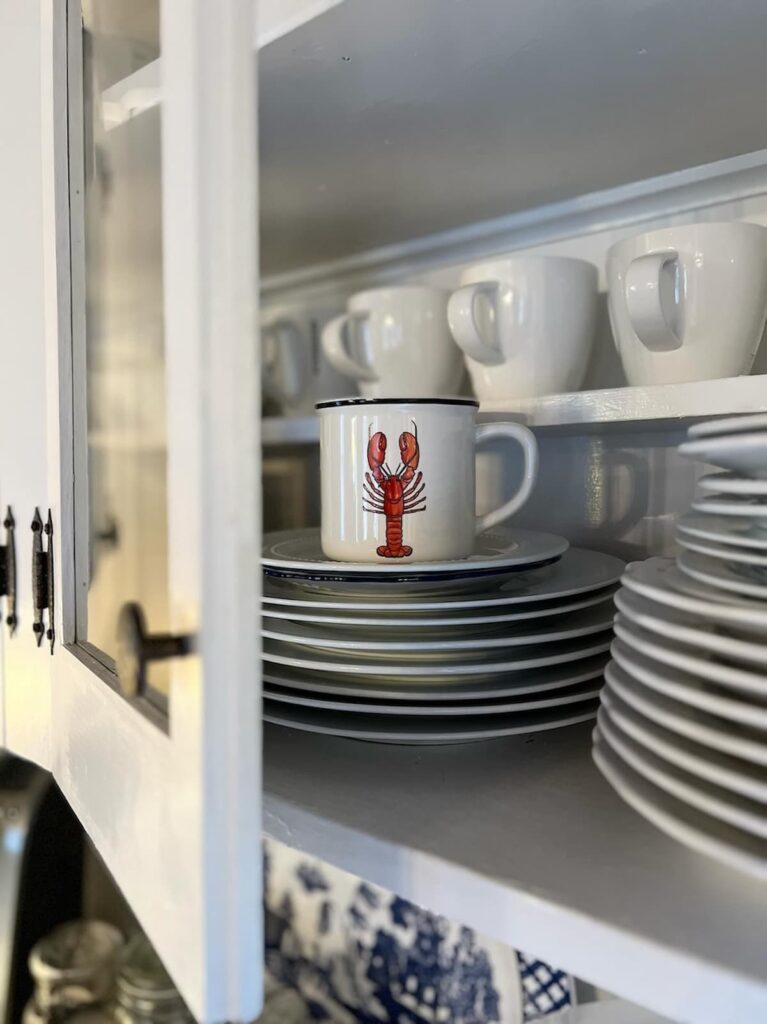 Lobster Mug in Cabinet with Dishes Little Squares of Joy Reader's Showcase