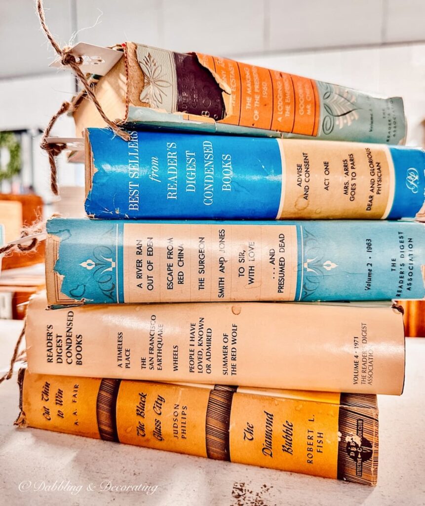 Stack of blue and orange old books for decorating.