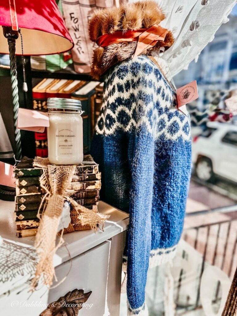 vintage fur hat on mannequin with blue Islandic sweater.