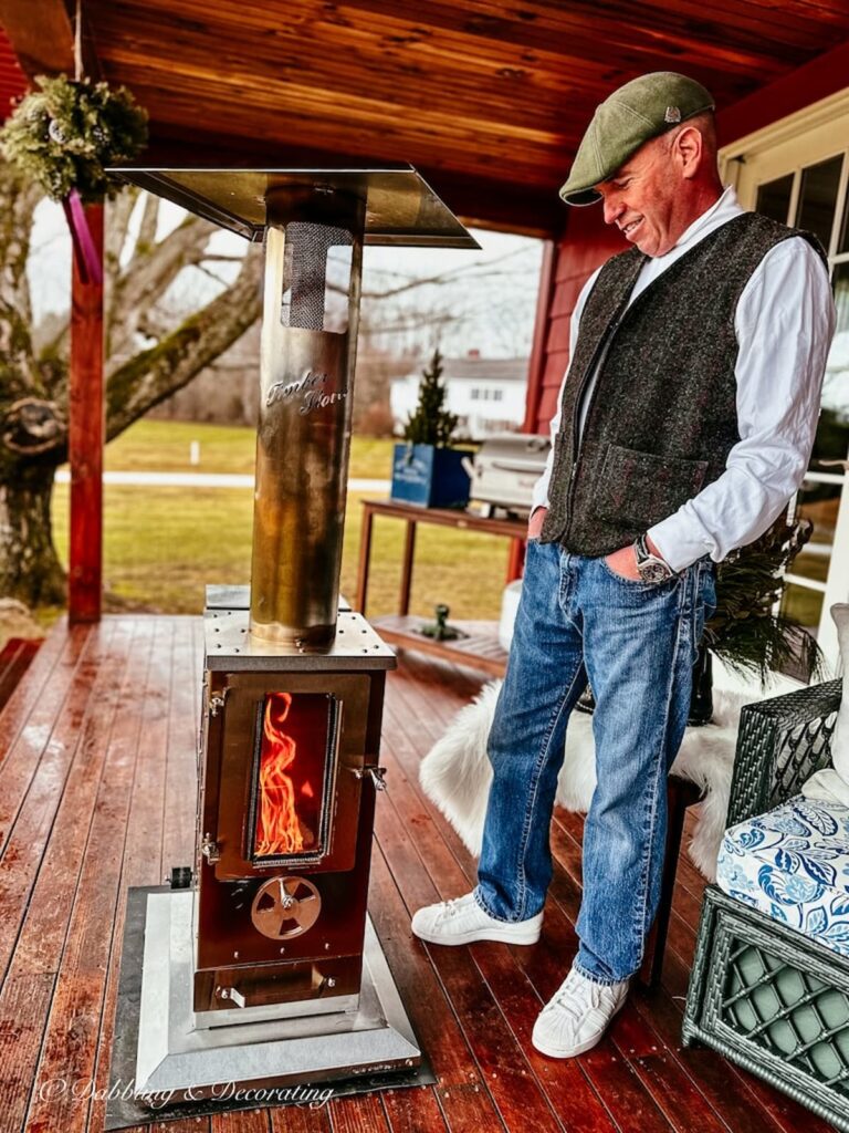 Wood Pellet Outdoor Heater Why Big Timber Stove and Man Looking at It.
