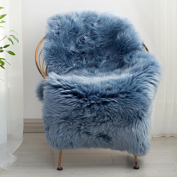 Blue sheepskin on chair for blue and white gift ideas for her.