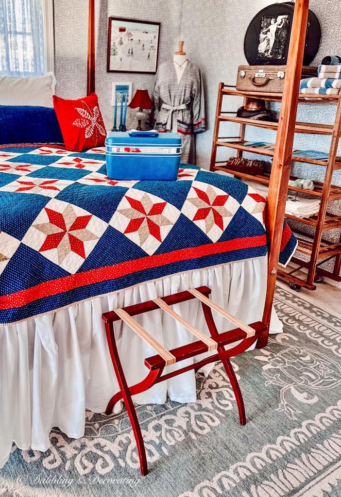 Bedroom with winter collection of vintage suitcases.