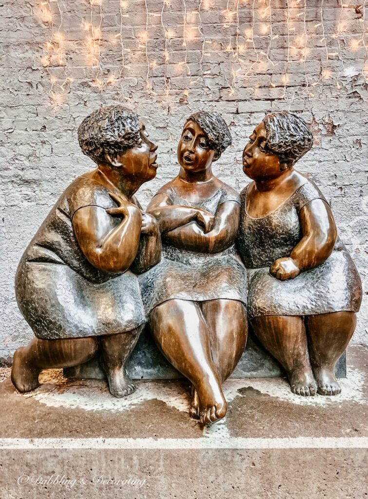 The Gossipers art statue as seen in Montreal
