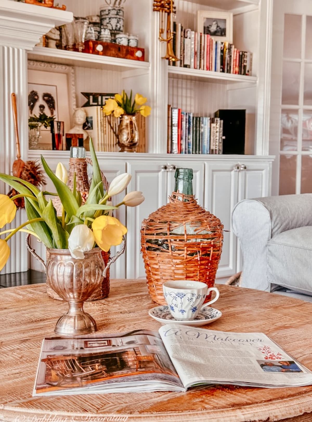 Coffee Table Decor, tulips, demijohns and magazine with thrift store decor ideas.