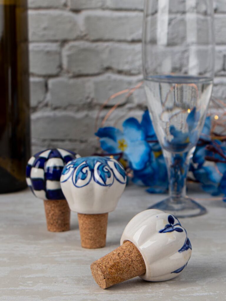Blue and white bottle stoppers for blue and white gifts for hostess gifts.