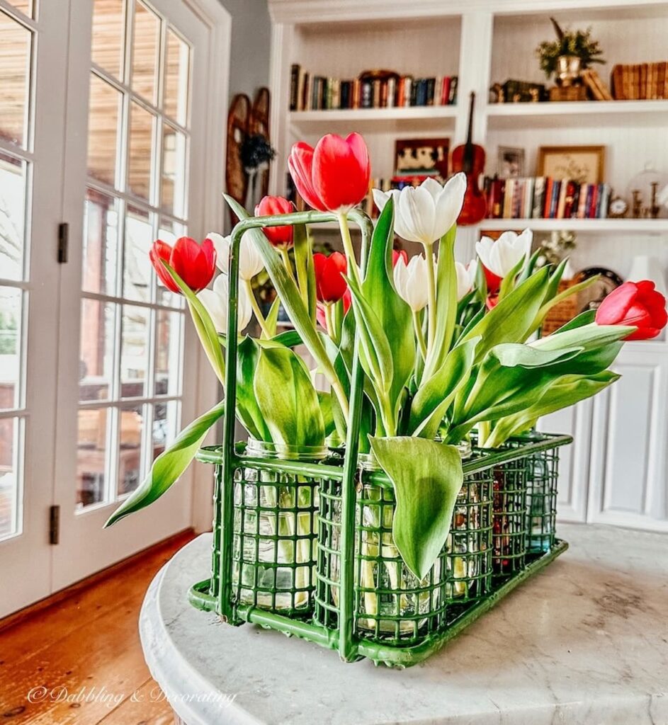 Gardening Caddy with Spring tulips on marble table top