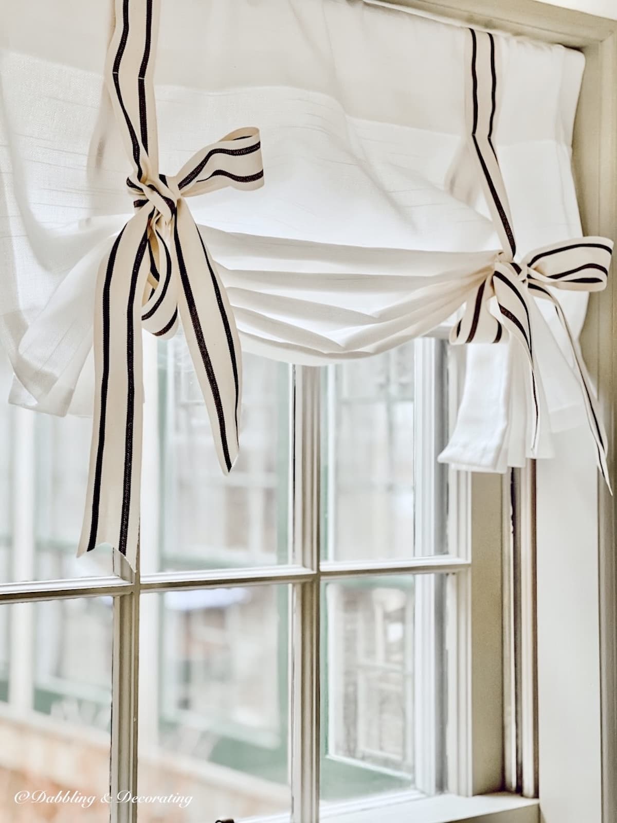 Tie Up Curtain in Window