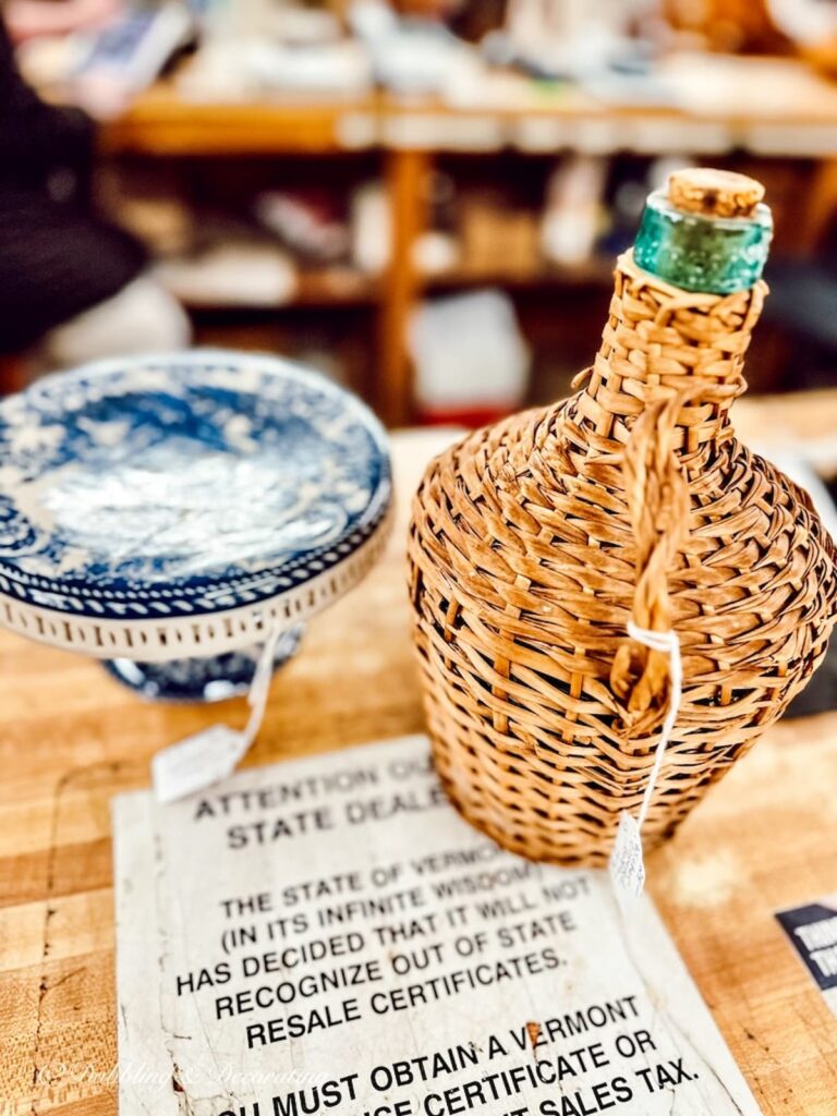 Vintage Demijohn and Blue and white cake stand.