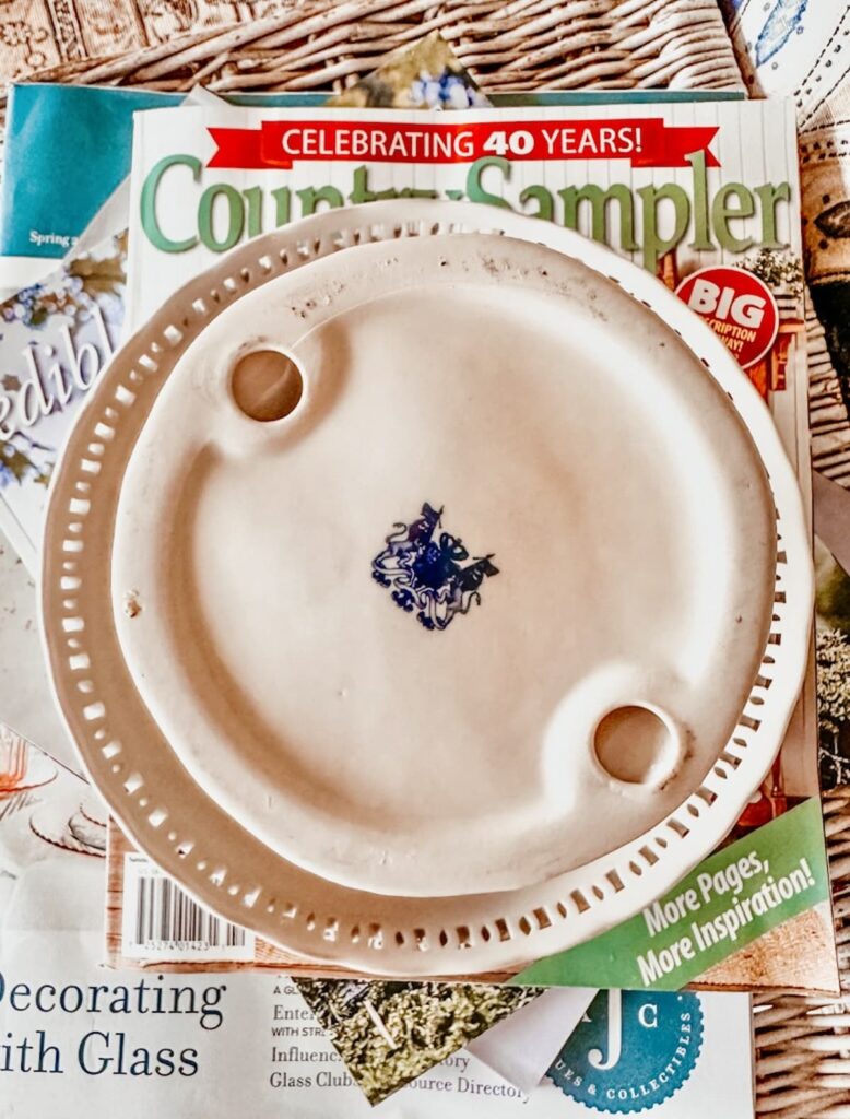 Dual Lion Marking on the bottom of a cottage farmhouse decor cake stand.