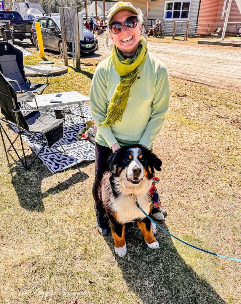 Woman with Bernese Mountain Dog