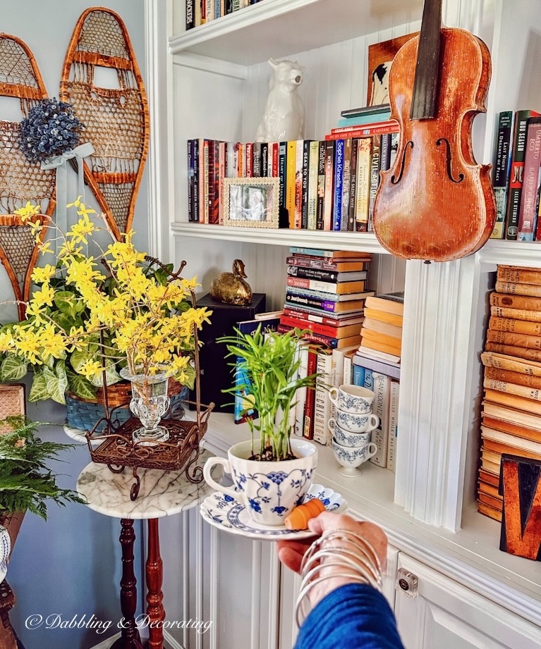 Book Nook Corner with Plant Decor in Unique Vessels.