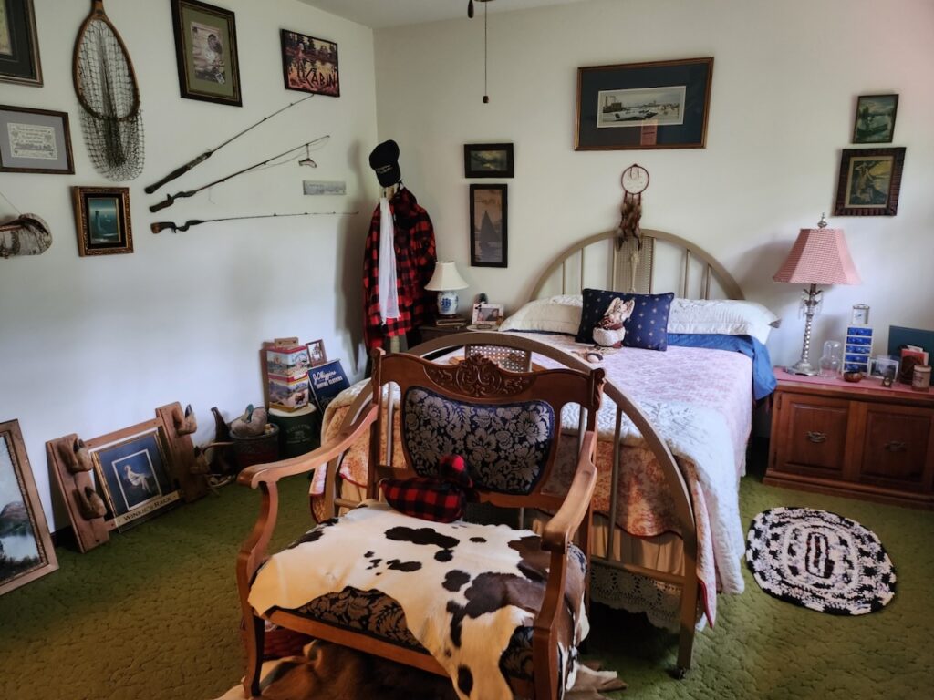 Bedroom decorated with lodge decor.