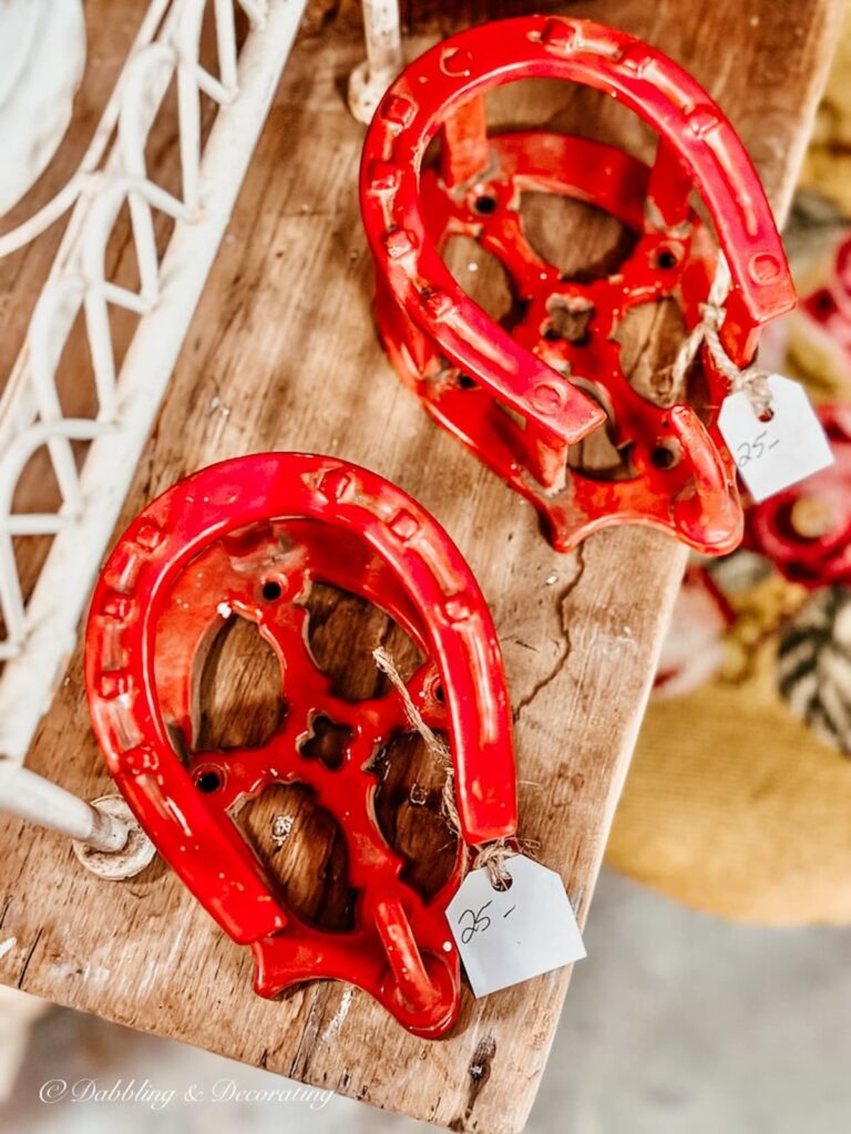 Red Horse Shoe Barn Hooks at vintage marketplace sale.