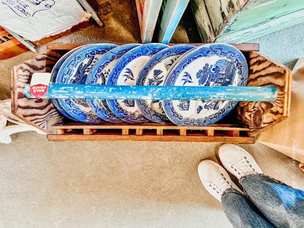 Vintage Marketplace Blue Dishes in Crate on Floor