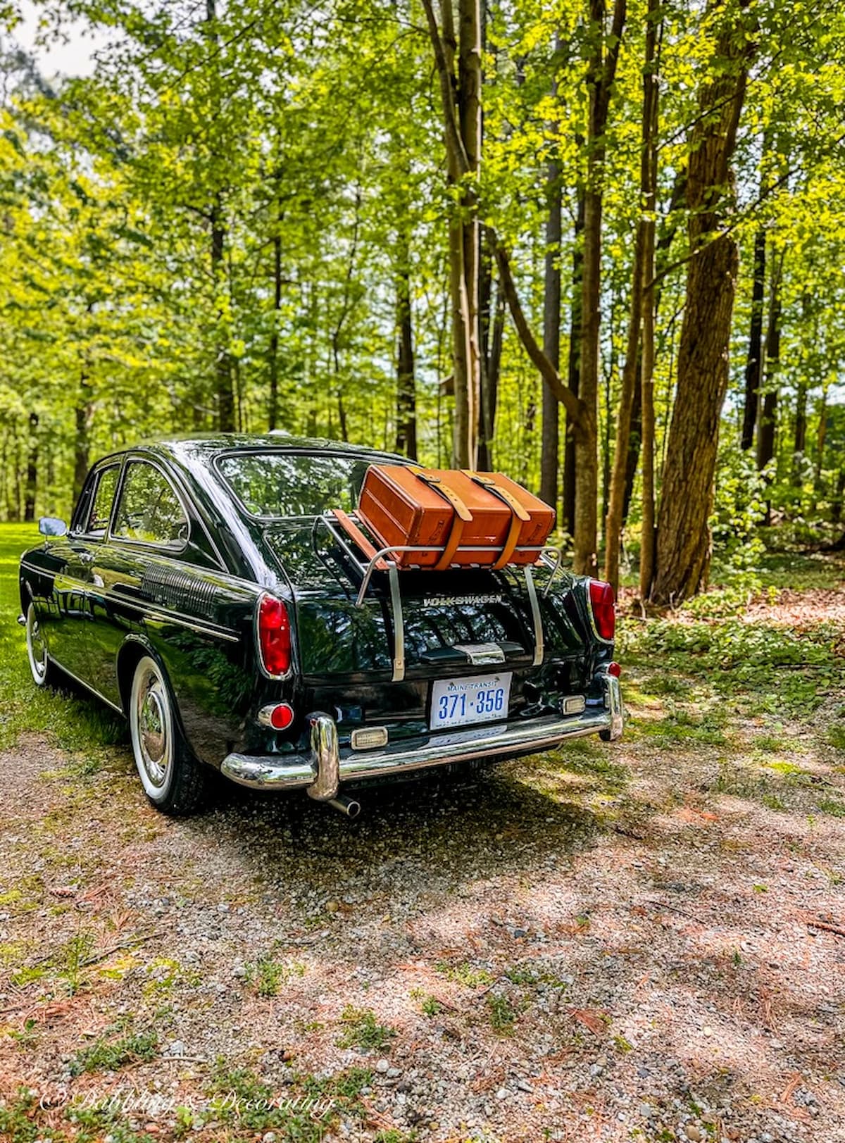 Classic 1968 VW Fastback with Vintage Luggage Rack and Suitcase on Trunk.