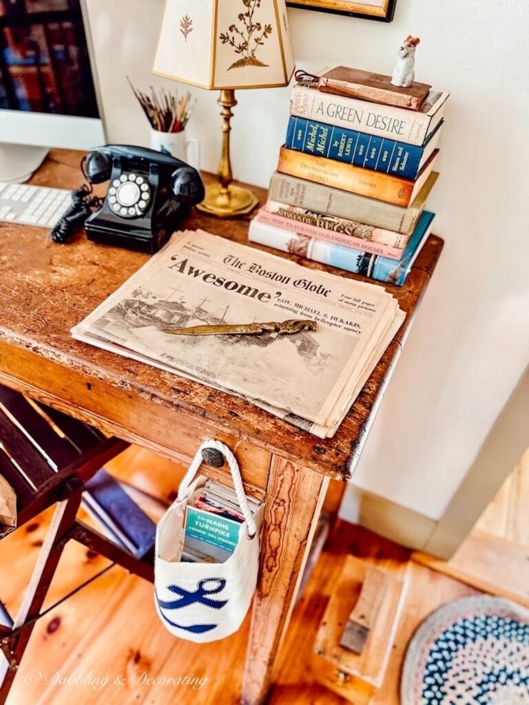 Vintage newspapers with storm headlines on old desk.
