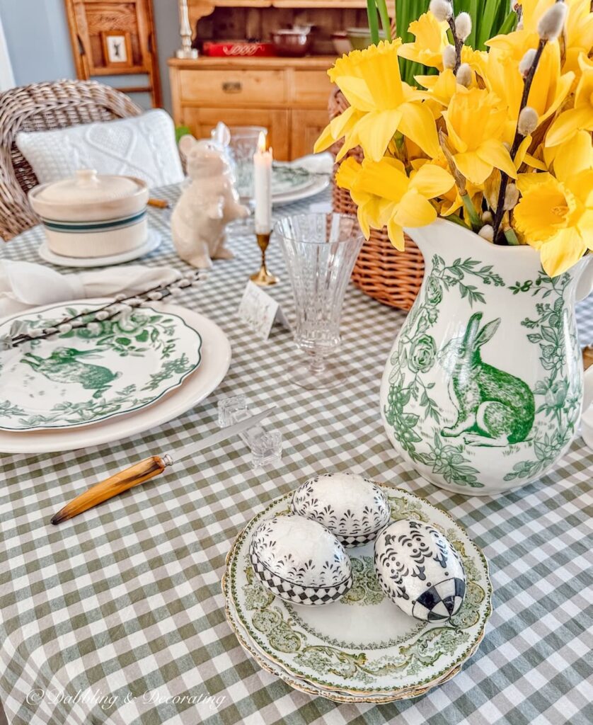 Easter Tablescape centerpiece with green and white pitcher and Daffodils.