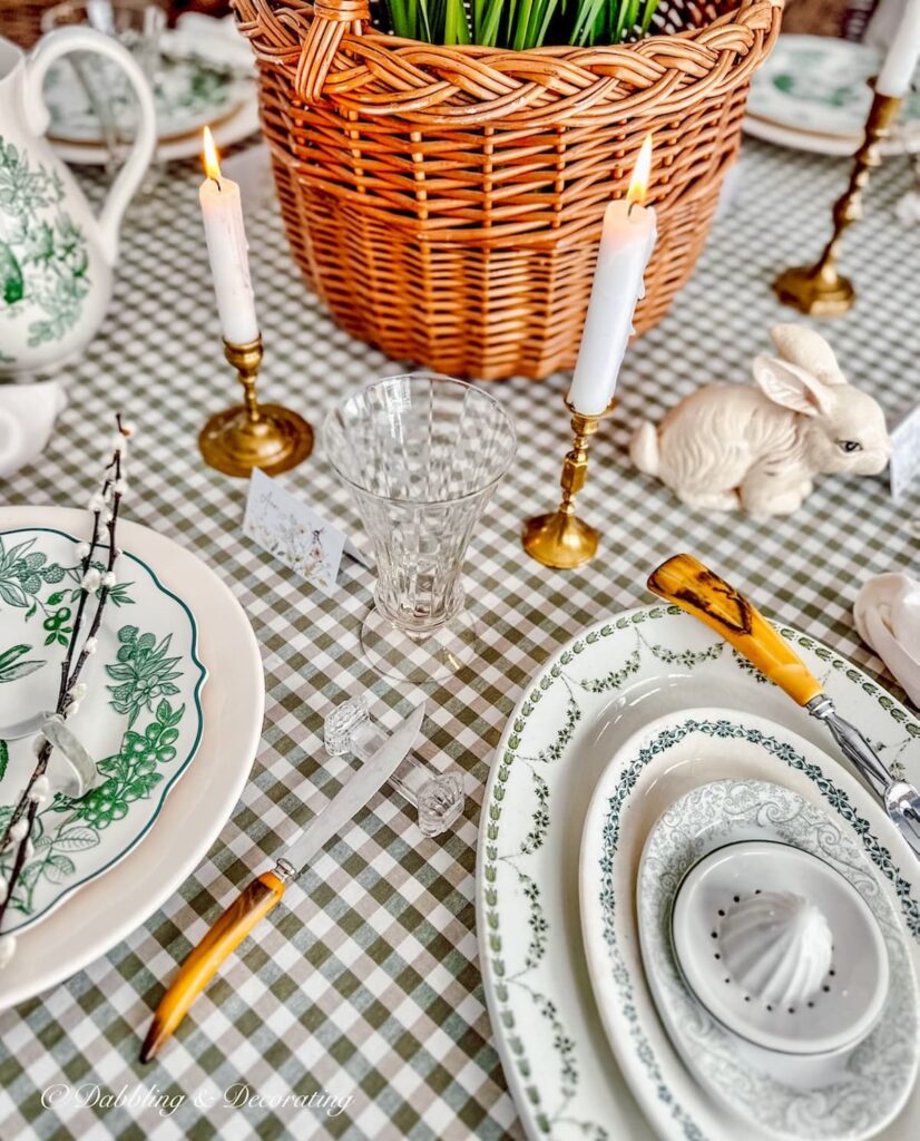 Vintage brass candlesticks on Easter Tablescape in green and white decor.