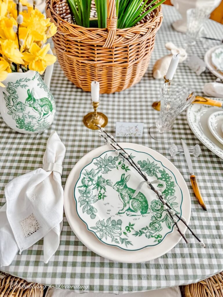 Green and white Easter Tablescape on green gingham tablecloth with Daffodils and basket of Paperwhites.