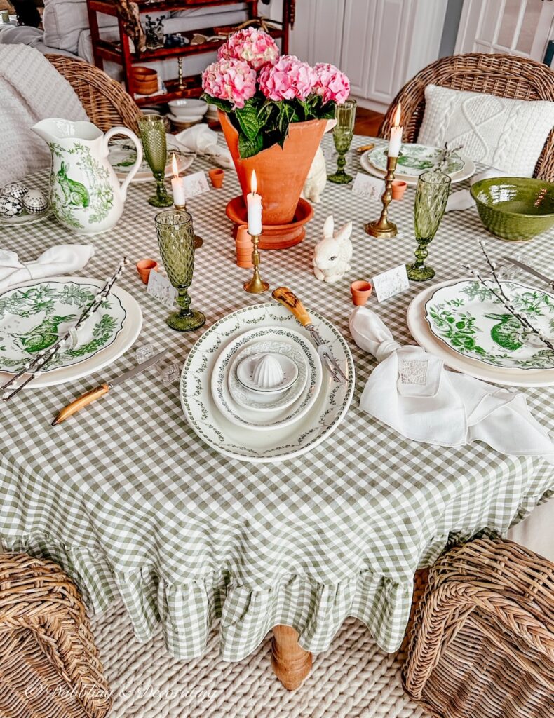 Tablescape ideas with green and white styled with gingham, vintage layered and spring charm.