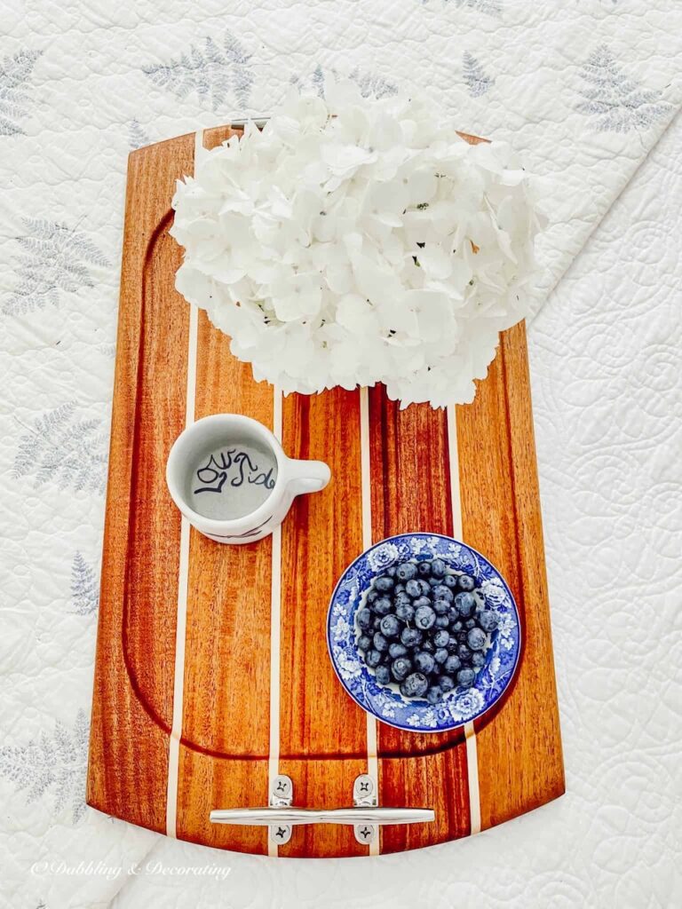 Nautical serving tray, wooden with breakfast on bed.