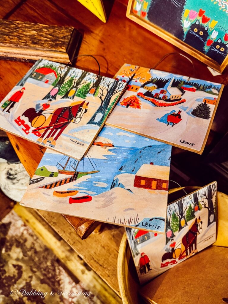 Hand painted colorful pictures in antique store in Nova Scotia.