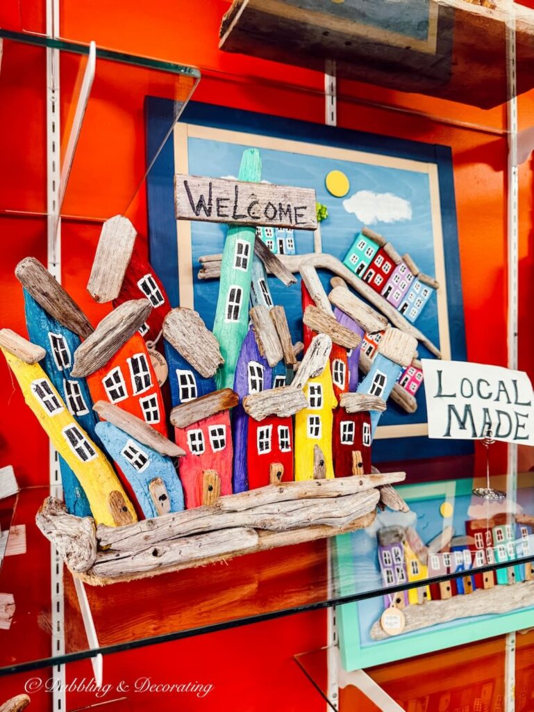 Locally made Newfoundland colorful driftwood houses display.