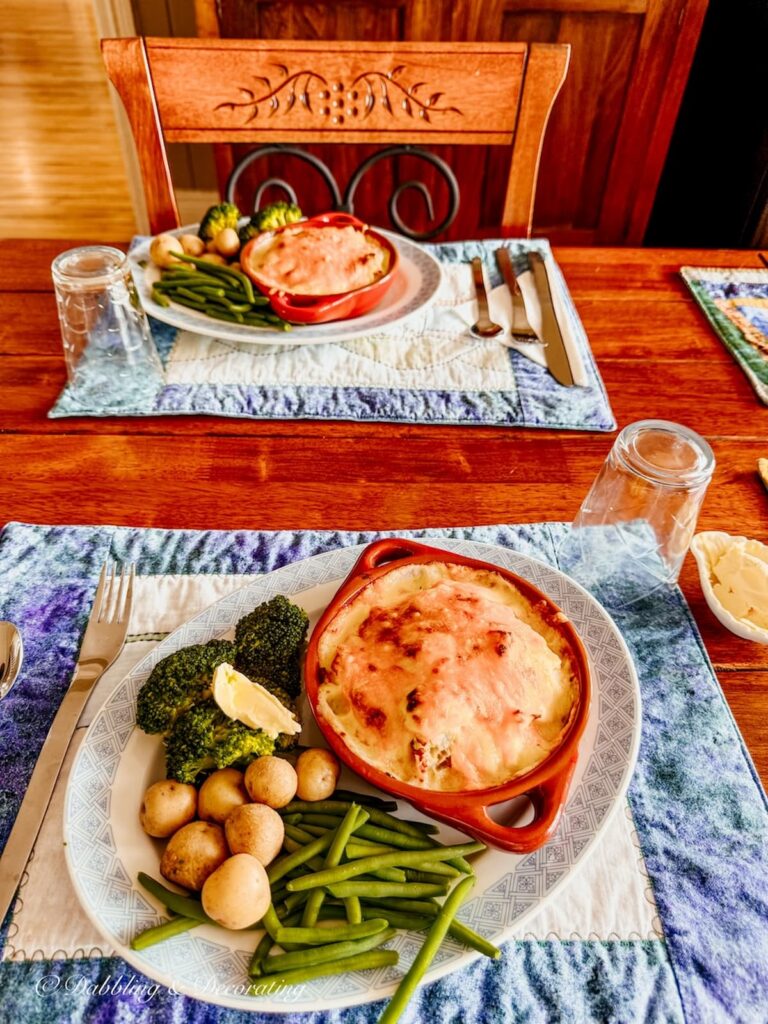 Home made au gratin cod on dining room table.