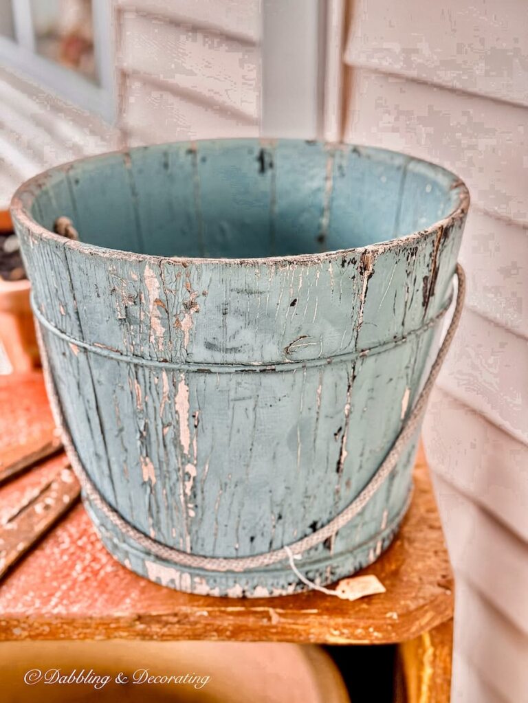 Pale blue chippy bucket at antique store in Maine.