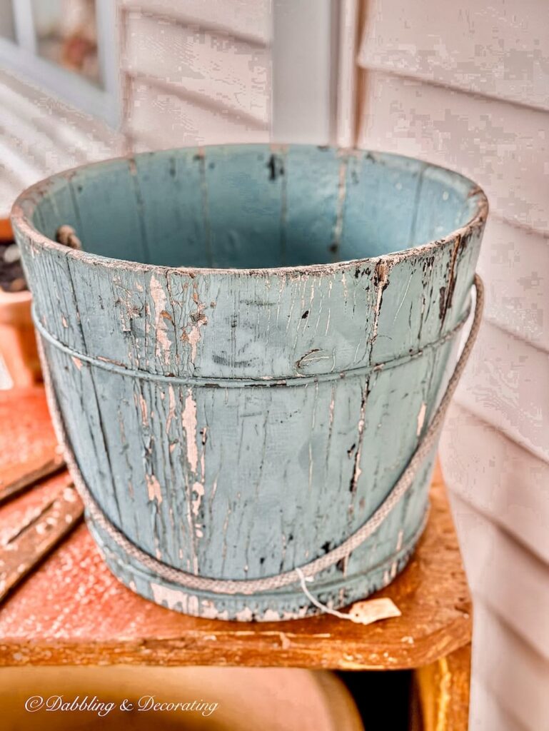 Pale blue chippy bucket at antique store in Maine inspired by Vintage Coastal Decor.