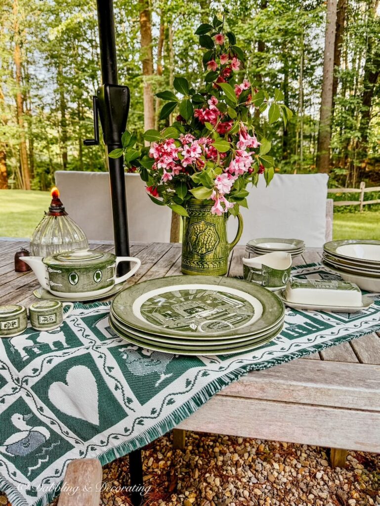 Set of Colonial Homestead in Green by Royal on Goodwill Northern New England, summer decor finds displayed on outdoor teak table.