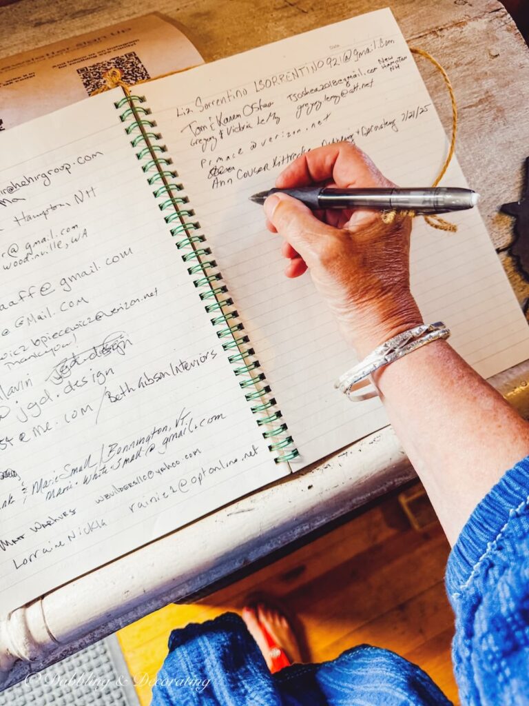 Signing the guest book at Old House Parts Company in Kennebunk, Maine.