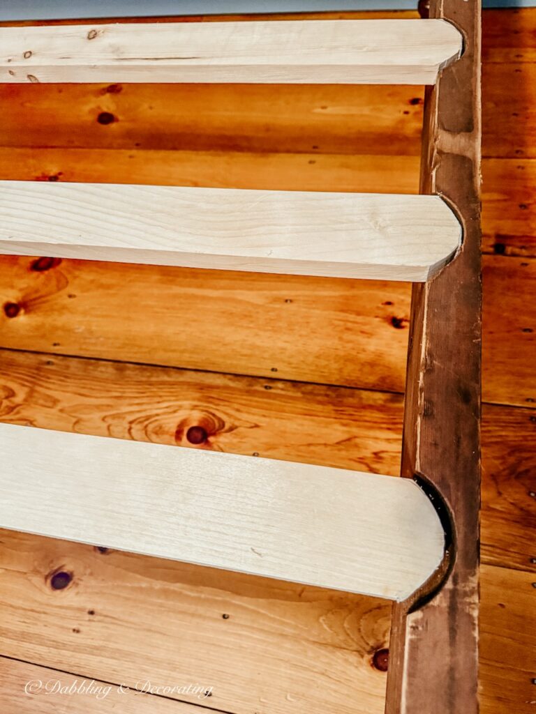 Homemade bed slats on an antique jenny lind bed makeover.