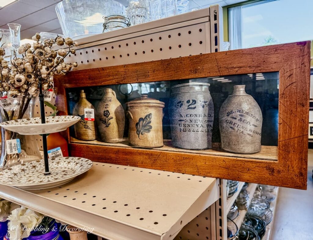 Antique just picture sitting on shelf at Goodwill Northern New England