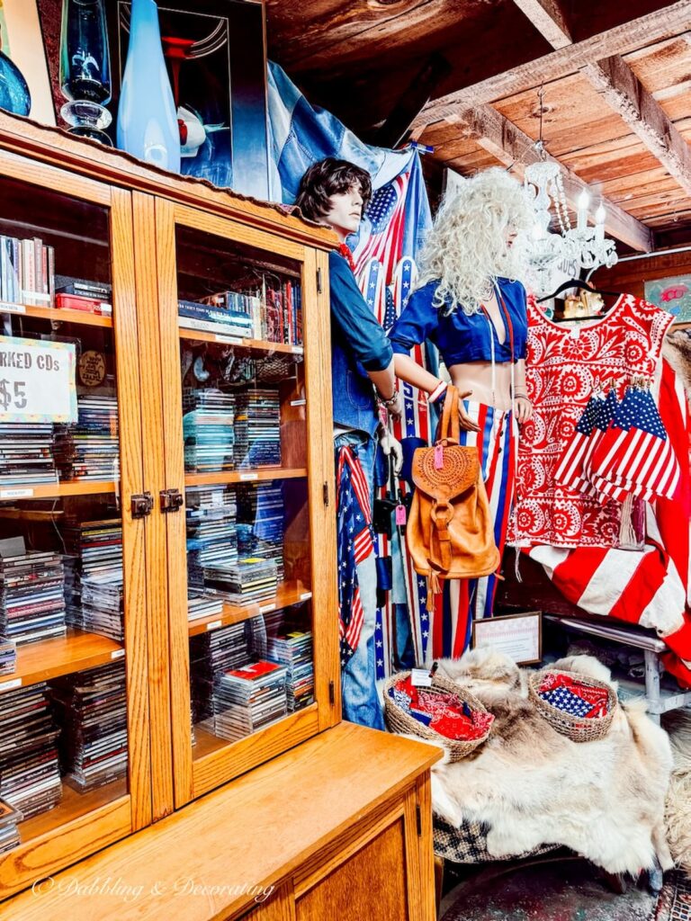 Mannequins in R.S. Butler’s Trading Company dressed up in USA fashion next to vintage record collection