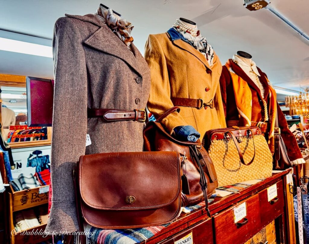 Vintage womens fashion lined up on Mannequins with conservative outfits at R.S. Butler’s Trading Company in NH.