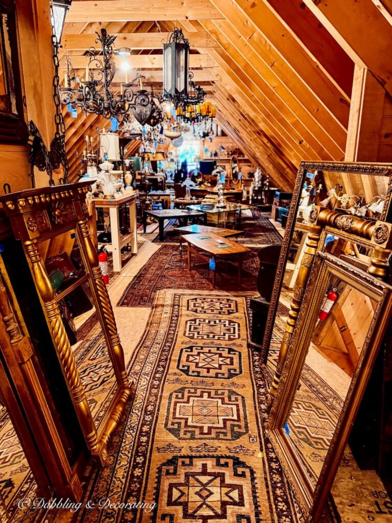 R.S. Butler’s Trading Company upstairs barn with mirrors, suitcases, chandeliers and more.