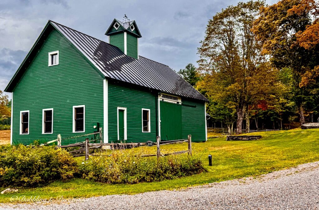Green New England Farmhouse in Vermont in fall decor ideas.